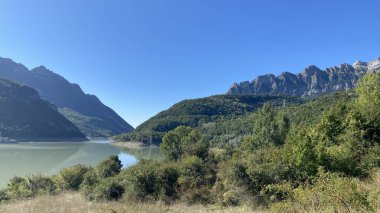 The Embalse de Bubal is a stunning reservoir located in the Pyrenean Valle de Tena, Huesca, Spain. clipart