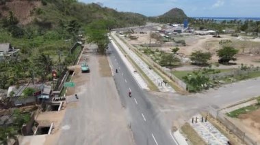 Kuta Mandalika Lombok bölgesinde insansız hava aracı yapımı, bu görüntü 12 Ekim 2022 civarında Jl 'de çekildi. Sengkol, Kuta, Pujut, Central Lombok Regency, West Nusa Tenggara, Endonezya, 83573size Fotage 3840x2160