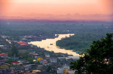 View from the highest point of the city and port of Chumphon when the sun sets