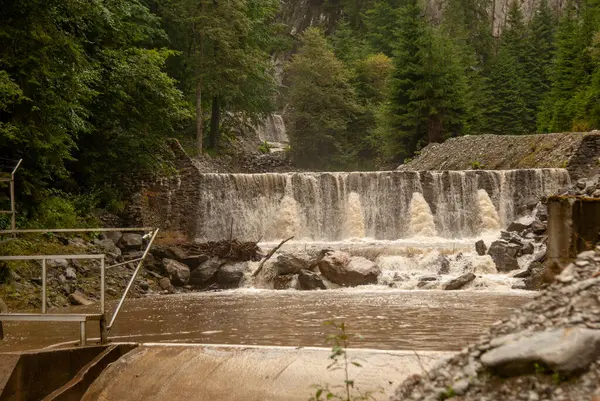 stock image Waterfall and torrential downpour after heavy rain in the Romanian mountains