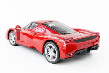 Dnipro, Ukrayna - 23 Ağustos 2022: Spor araba oyuncak modeli, Ferrari kaslı araba prototipi beyaz arka planda, seçici odaklı