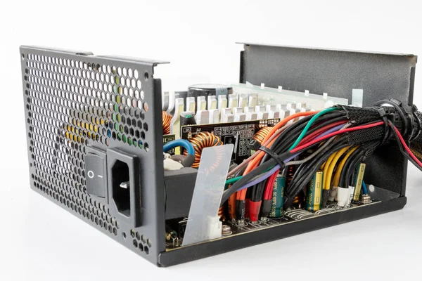 Gedemonteerde Computer Power Supply Unit Een Witte Geïsoleerde Achtergrond — Stockfoto