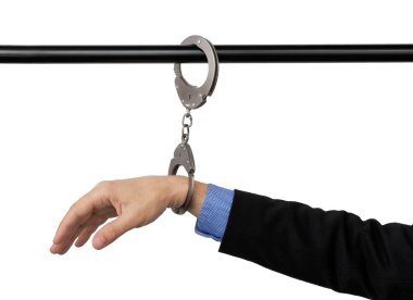 businessman's hand handcuffed to a pipe, anti-corruption concept, cut out on isolated background. clipart
