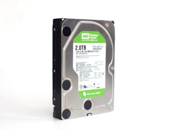 Dnipro, Ukraine - March 16, 2024: 2tb hard drive storage space simple six terabyte 35 inch hard drive, Western Digital company logo on label of hard disk drive green for pc, close-up. clipart