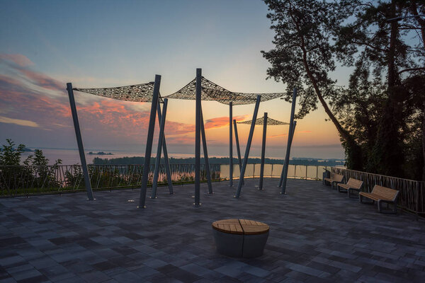 Sunrise over Dnieper river. Scenic view from Sosnovy Bir park in Cherkasy, Ukraine.