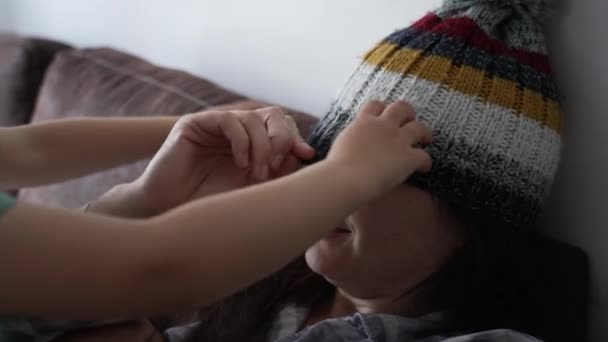Child Putting Beanie Mother Little Boy Son Interacting Mother Wearing — Stock Video