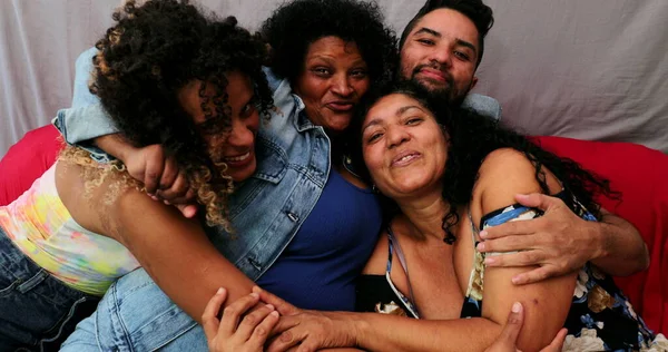 Brazilian family love and affection. Latin hispanic people hugging and embrace