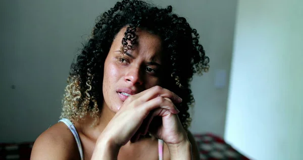 Desperate depressed woman crying in despair, crying person Hispanic ethnicity