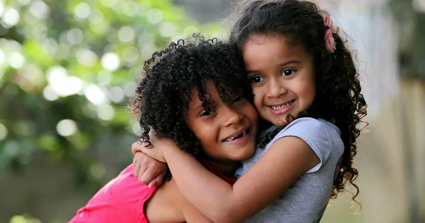 Hispanic Siblings Embrace Hug Two Sisters Love — Stock Photo, Image