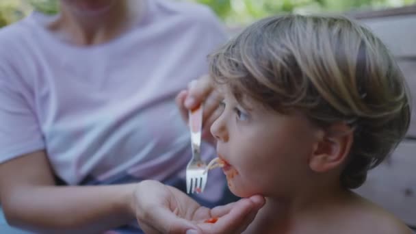 Parent Feeds Noodle Pasta Child Lunch Mother Feeding Spaghetti Small — Stock Video
