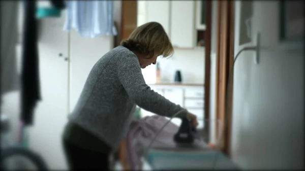 Casual Senior Woman Doing Housework Chores Laundry Room — Stock Photo, Image