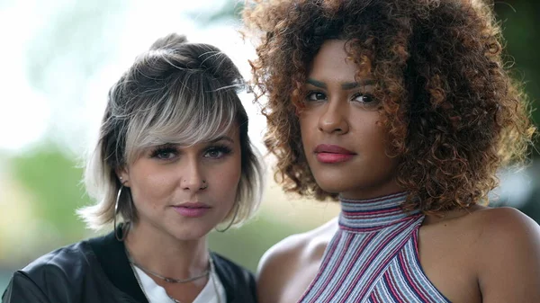 Stock image Two diverse women portrait faces looking at camera