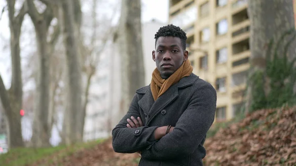 Black Man Arms Crossed Standing Park Thinking Wearing Winter Coat — Φωτογραφία Αρχείου