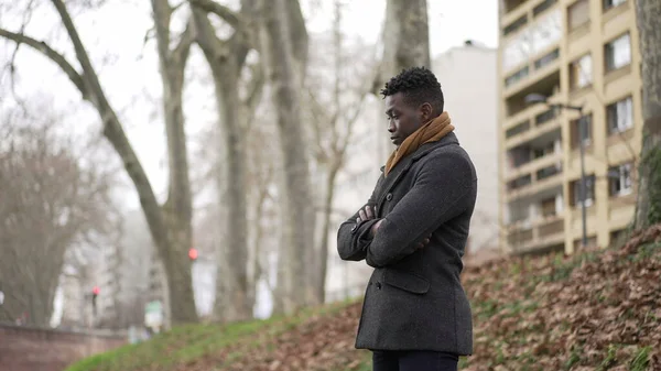 Black Man Arms Crossed Standing Park Thinking Wearing Winter Coat — Stock Fotó