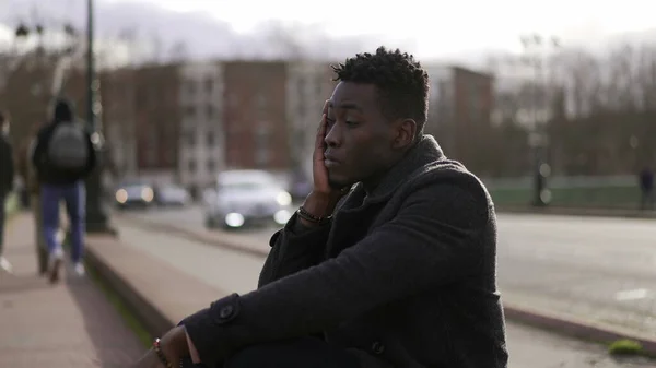 Anxious Young Black Man Suffering Emotional Pain Sitting Sidewalk Street — ストック写真