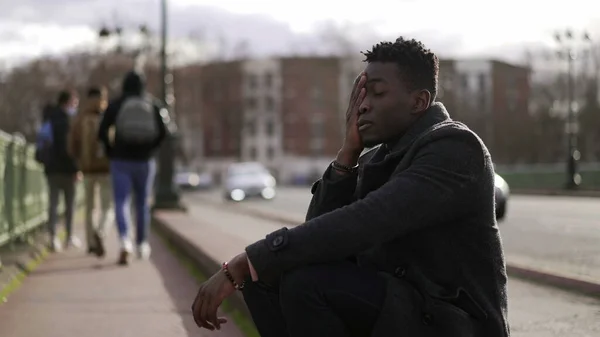 Anxious Young Black Man Suffering Emotional Pain Sitting Sidewalk Street — 图库照片