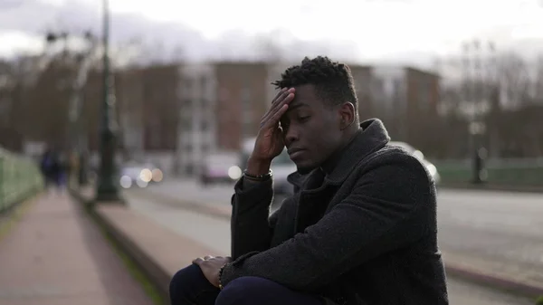 Anxious Black Man Sitting Sidewalk Feeling Worried — Foto de Stock
