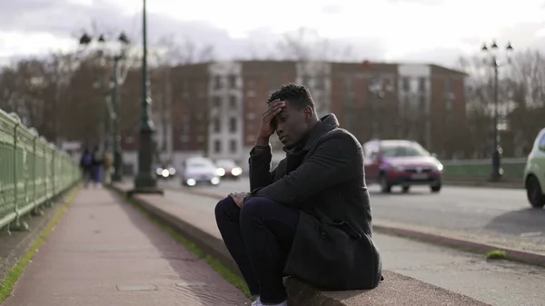 Anxious Black Man Sitting Sidewalk Feeling Worried — 图库照片