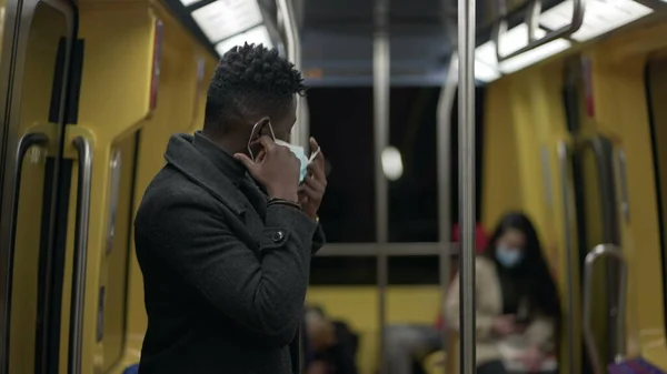 Black Man Commuter Removing Face Mask Metro Subway End Pandemic — стоковое фото