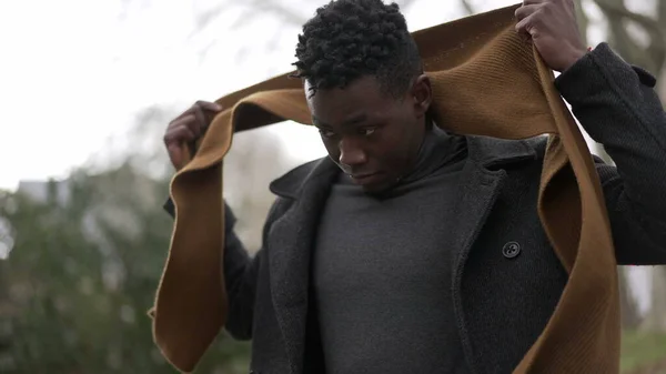 Black Man Putting Scarf Outdoors Winter Season African Guy Adjusting — Stock Fotó