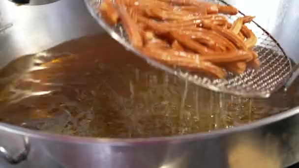 Preparing Fried Churros Street Food Vendor Prepares Churros Oily Large — Stock Video