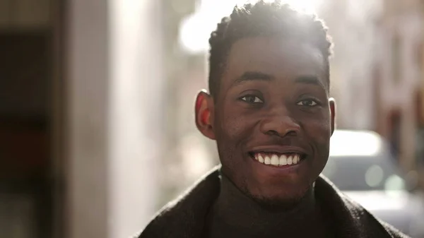 Confident Young Black Man Portrait Smiling Camera City Drizzle Sunlight — Stock Photo, Image