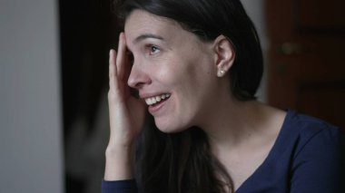 Woman reacting with surprise and unbelief to news told by friend. Person closeup face emotional reaction with consternation