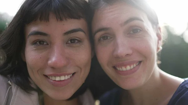 Two Young Women Faces Together Cheek Cheek Portrait Diverse People — Foto Stock