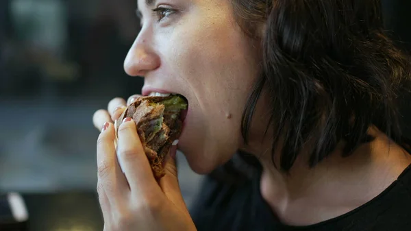 Hispanic Woman Taking Bite Burger Latina American Girl Eating Cheeseburger — Zdjęcie stockowe