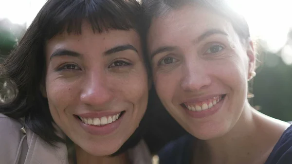 Two Young Women Faces Together Cheek Cheek Portrait Diverse People — Foto Stock