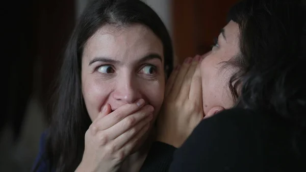 Friend Telling Secret Woman Ear Whispering Young Woman Shock Surprise — Foto de Stock