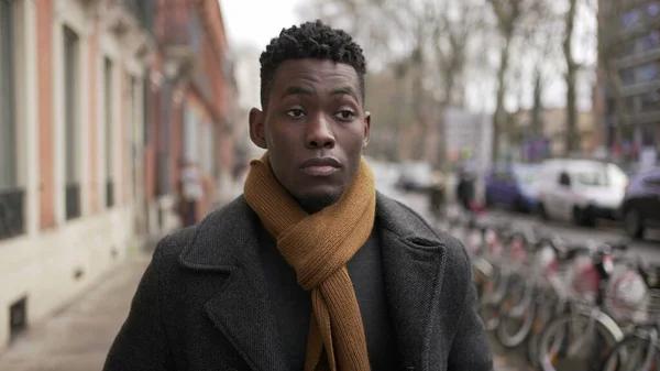 Elegant Young Black Man Walking Sidewalk Winter Season Exploring City — стоковое фото