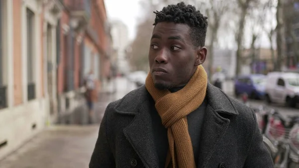 Elegant Young Black Man Walking Sidewalk Winter Season Exploring City — стоковое фото