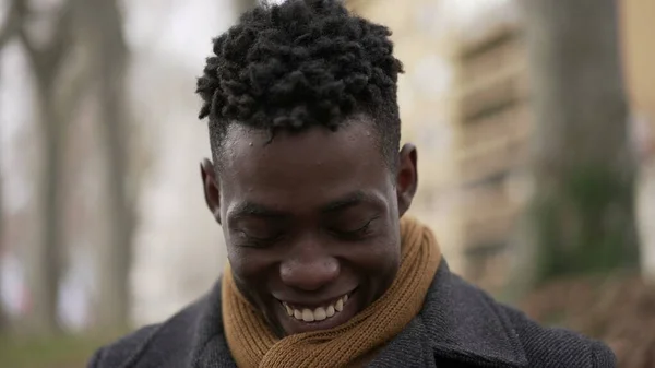 Charismatic Happy Black African Young Man Smiling Wearing Scarf Winter — Stok fotoğraf