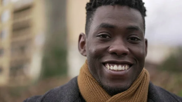 Charismatic Happy Black African Young Man Smiling Wearing Scarf Winter — стоковое фото
