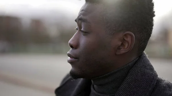 Pensive Concerned Black African Man Sitting City Sidewalk Curb Feeling — стоковое фото