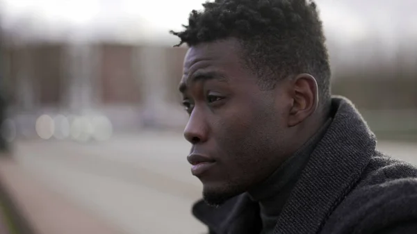 Pensive Concerned Black African Man Sitting City Sidewalk Curb Feeling — стокове фото