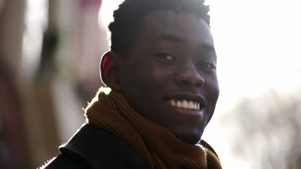 Portrait Black African Man Smiling Camera Flare Sunlight Outdoors — Stok fotoğraf