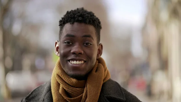 Portrait Black African Male Smiling Camera Wearing Scarf City — стоковое фото