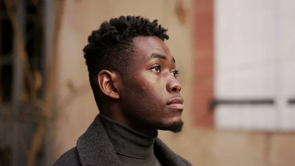 Pensive Young Black African Man Standing Outdoors — Stock Fotó