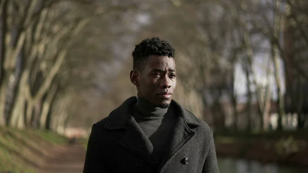 Pensive Young African Man Walking City Park Nature Winter Season — ストック写真