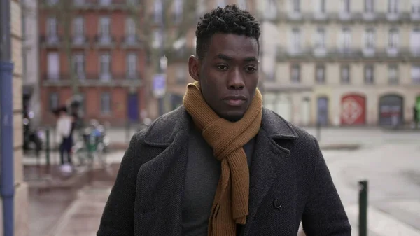 Pensive Young Black Man Walking City Cold — ストック写真