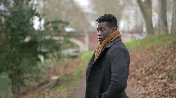 Serious Black African Man Standing Park Wearing Winter Clothing Thinking — Foto de Stock