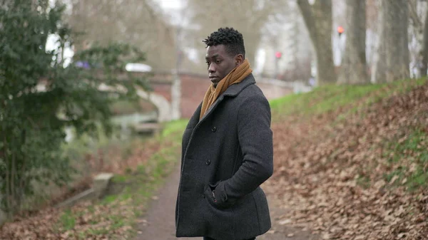 Serious Black African Man Standing Park Wearing Winter Clothing Thinking — ストック写真