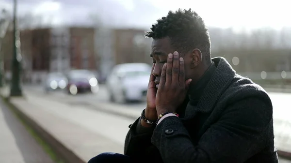 Preoccupied Black African Man Sitting City Street Curb Feeling Anxiety — 图库照片