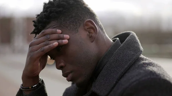 Worried Black Man Sitting Floor Street Having Problems Rubbing Face — Stock Fotó