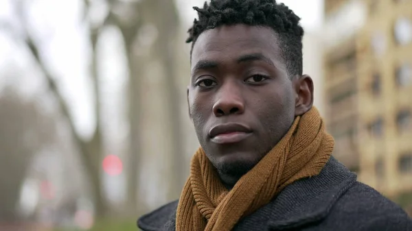 Young Black Man Standing Wearing Coat Scarf Looking Camera Portrait — стоковое фото