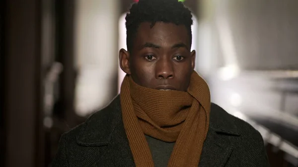 Young Black Man Wearing Scarf Winter Clothing Walking Corridor Leaving — Stockfoto