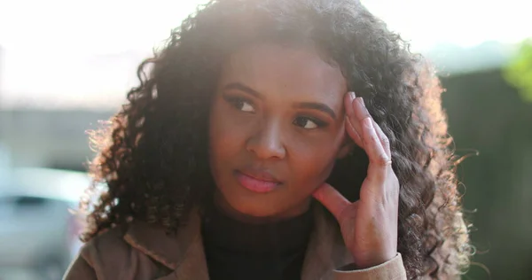 stock image Nervous anxious young black woman standing outside fidgets with hands