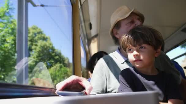 Grandfather Traveling Train Small Grandson Seated Lap Window Grandparent Bonding — Stock Video
